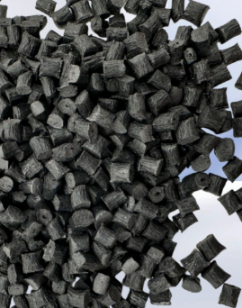 Close-up of black carbon-fiber reinforced polyamide granules